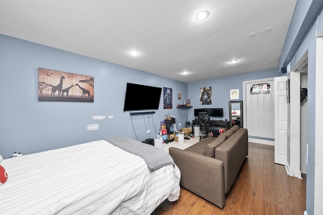 10302 W Palmer Ave, Melrose Park, IL 60164 - bedroom with wood finished floors and recessed lighting