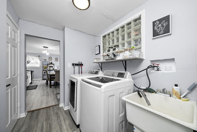 10302 W Palmer Ave, Melrose Park, IL 60164 - washroom featuring dark wood finished floors and washer and clothes dryer
