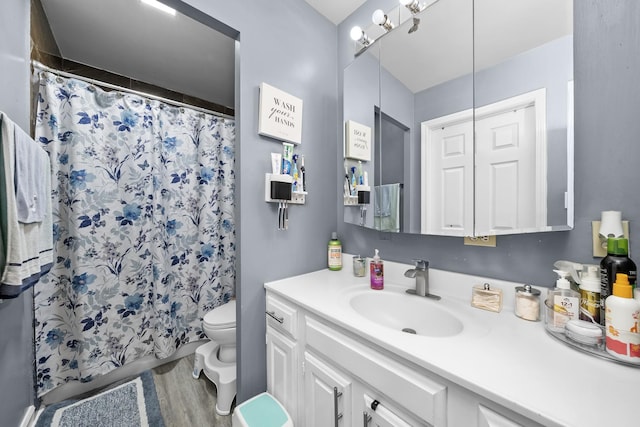 10302 W Palmer Ave, Melrose Park, IL 60164 - full bath featuring vanity and wood finished floors