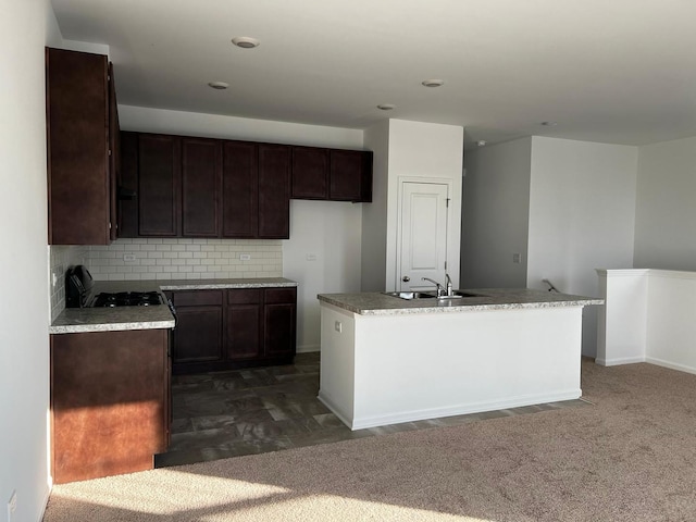 4219 Chelsea Manor Cir, Aurora, IL 60504 - kitchen featuring a center island with sink, dark brown cabinetry, decorative backsplash, and light countertops