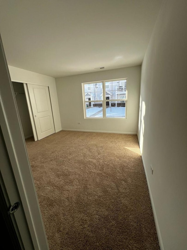 4219 Chelsea Manor Cir, Aurora, IL 60504 - carpeted spare room with baseboards