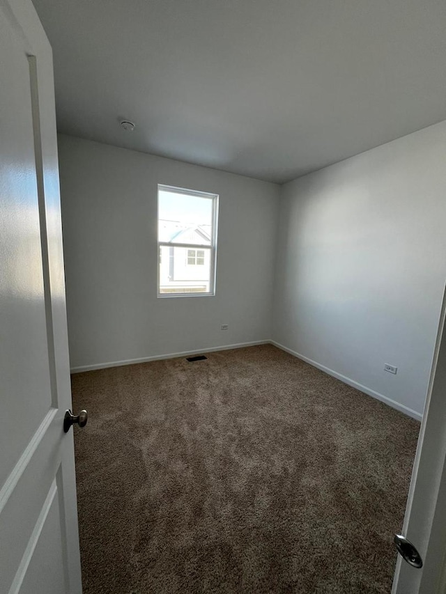 4219 Chelsea Manor Cir, Aurora, IL 60504 - carpeted empty room with baseboards