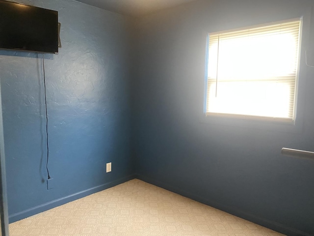 308 S 5th Ave, Streator, IL 61364 - carpeted spare room with baseboards