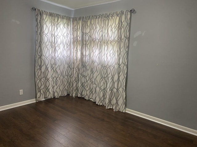 308 S 5th Ave, Streator, IL 61364 - spare room featuring wood finished floors and crown molding