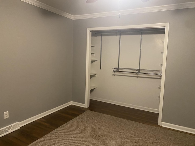308 S 5th Ave, Streator, IL 61364 - unfurnished bedroom featuring ornamental molding, wood finished floors, and a closet