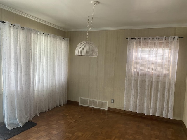308 S 5th Ave, Streator, IL 61364 - unfurnished dining area featuring crown molding and baseboards