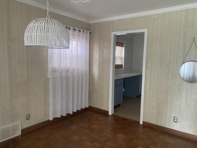 308 S 5th Ave, Streator, IL 61364 - unfurnished dining area featuring baseboards and ornamental molding