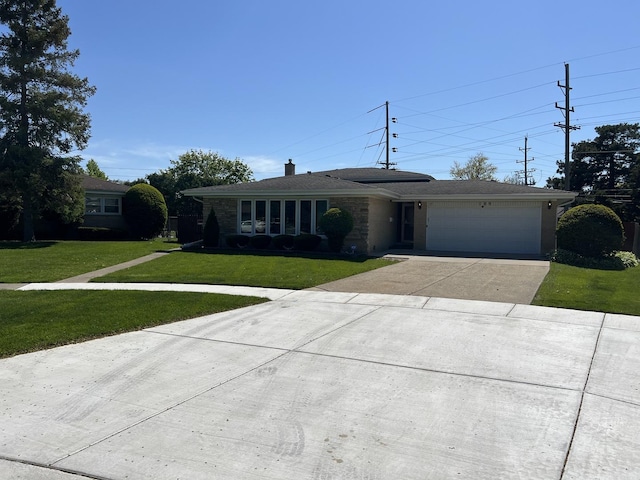 189 Ambleside Rd, Des Plaines, IL 60016 - ranch-style house with a garage, a front lawn, and concrete driveway