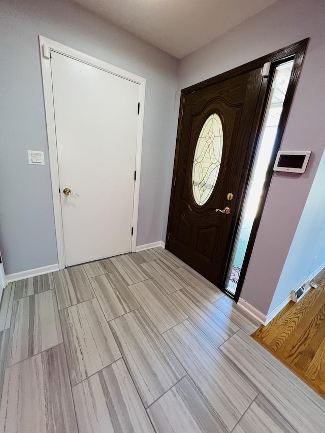 189 Ambleside Rd, Des Plaines, IL 60016 - foyer with light wood finished floors