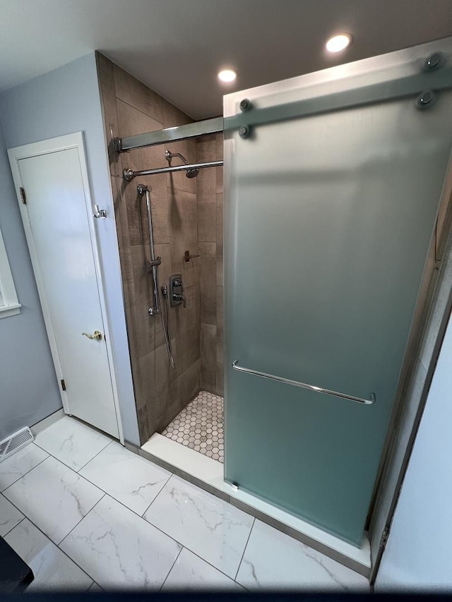 189 Ambleside Rd, Des Plaines, IL 60016 - full bathroom with a stall shower, recessed lighting, and marble finish floors