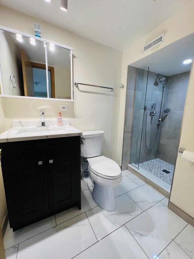 189 Ambleside Rd, Des Plaines, IL 60016 - full bath featuring marble finish floors, a tile shower, and vanity