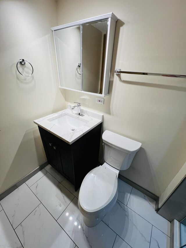 189 Ambleside Rd, Des Plaines, IL 60016 - half bathroom with marble finish flooring and vanity