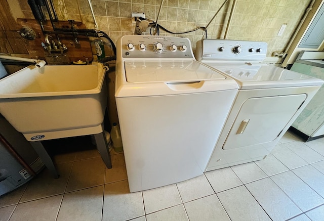 189 Ambleside Rd, Des Plaines, IL 60016 - laundry room featuring separate washer and dryer and light tile patterned flooring