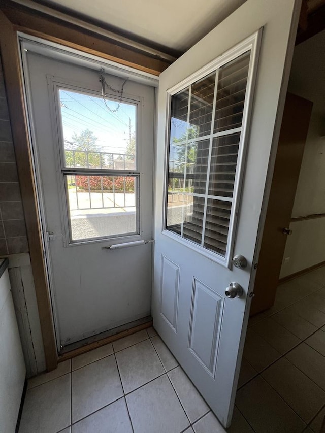 189 Ambleside Rd, Des Plaines, IL 60016 - doorway featuring tile patterned floors and healthy amount of natural light