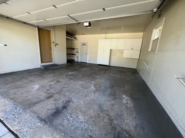 189 Ambleside Rd, Des Plaines, IL 60016 - garage featuring a garage door opener