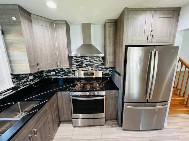 189 Ambleside Rd, Des Plaines, IL 60016 - kitchen with wall chimney range hood, appliances with stainless steel finishes, dark countertops, tasteful backsplash, and recessed lighting