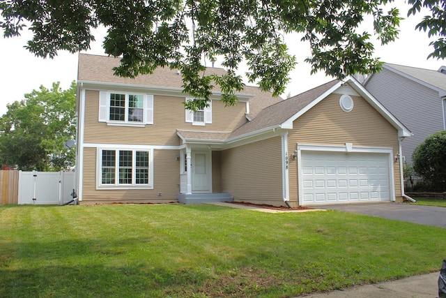 1098 Clover Hill Ln, Elgin, IL 60120 - view of front of home featuring asphalt driveway, an attached garage, a gate, and roof with shingles