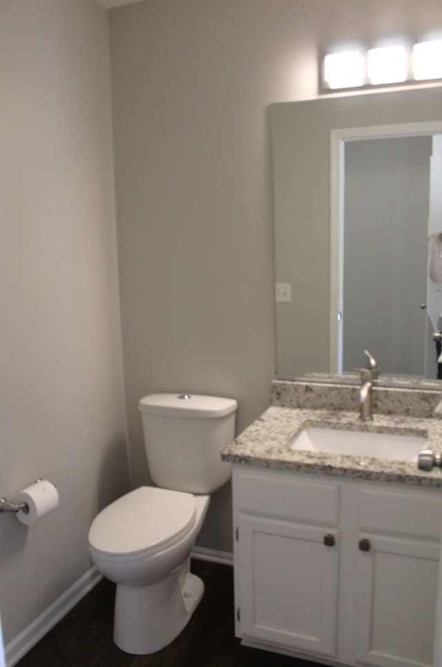 1098 Clover Hill Ln, Elgin, IL 60120 - bathroom featuring vanity and wood finished floors