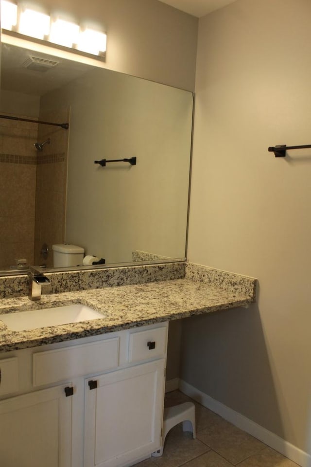 1098 Clover Hill Ln, Elgin, IL 60120 - full bath featuring a tile shower, tile patterned flooring, and vanity