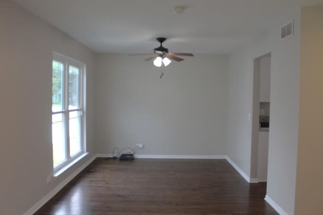 1098 Clover Hill Ln, Elgin, IL 60120 - unfurnished room with dark wood-style flooring and a ceiling fan