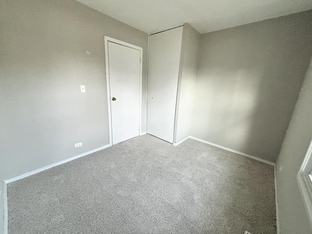 1034 E Tulip Way, Palatine, IL 60074 - unfurnished bedroom with carpet floors and a closet