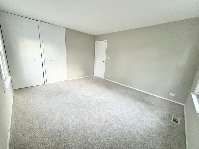 1034 E Tulip Way, Palatine, IL 60074 - unfurnished bedroom with carpet floors and multiple closets