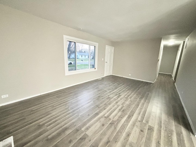 1034 E Tulip Way, Palatine, IL 60074 - unfurnished living room featuring dark wood-style flooring