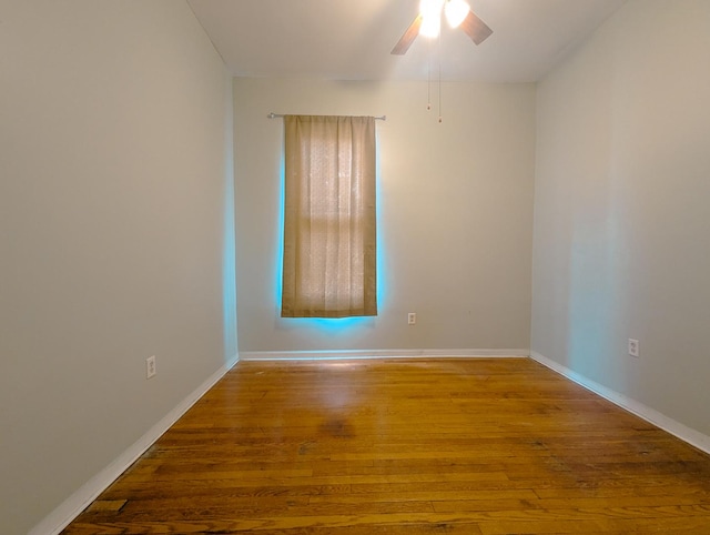 104 W 112th Pl, Chicago, IL 60628 - empty room featuring wood finished floors and ceiling fan