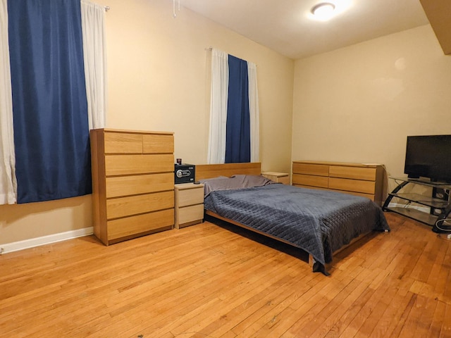 104 W 112th Pl, Chicago, IL 60628 - bedroom with light wood-type flooring