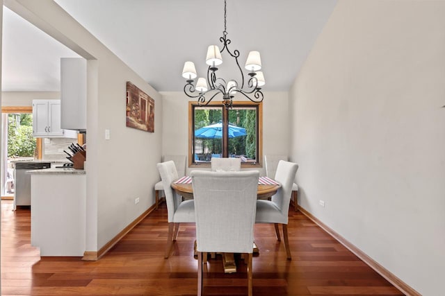 17019 Danielle Ct, Oak Forest, IL 60452 - dining room featuring a chandelier, wood finished floors, and vaulted ceiling