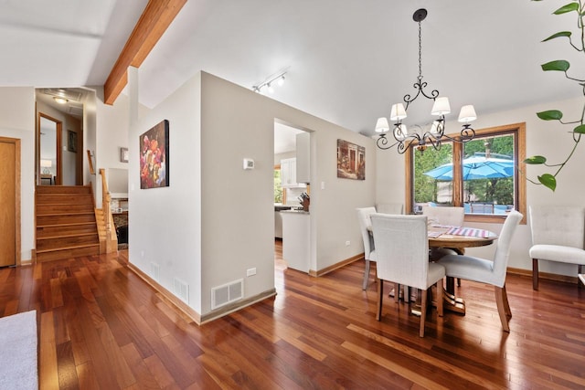 17019 Danielle Ct, Oak Forest, IL 60452 - dining room featuring wood-type flooring, a chandelier, and stairs