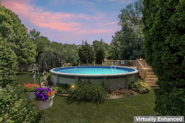 17019 Danielle Ct, Oak Forest, IL 60452 - pool at dusk featuring a deck and an outdoor pool