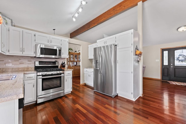 17019 Danielle Ct, Oak Forest, IL 60452 - kitchen with appliances with stainless steel finishes, white cabinetry, tasteful backsplash, dark wood-style floors, and beamed ceiling