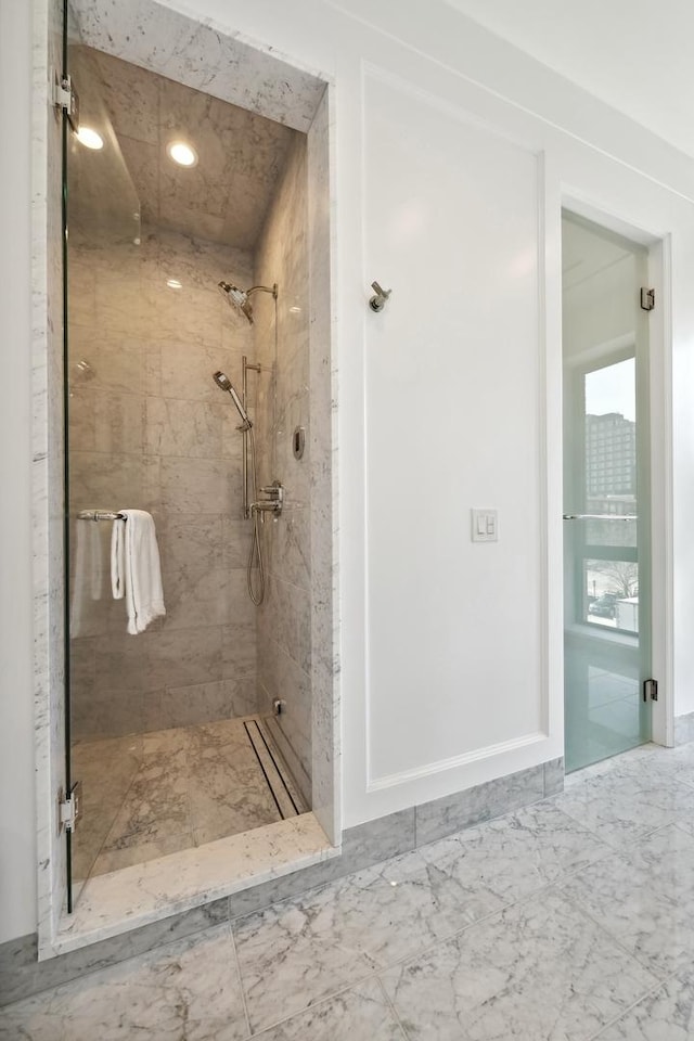 116 N Willard Ct Unit 301, Chicago, IL 60607 - full bathroom featuring a stall shower, marble finish floors, and recessed lighting