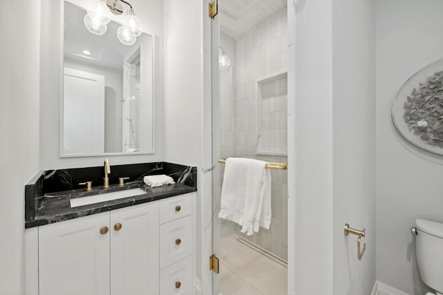 116 N Willard Ct Unit 301, Chicago, IL 60607 - bathroom featuring vanity, a stall shower, and tile patterned floors