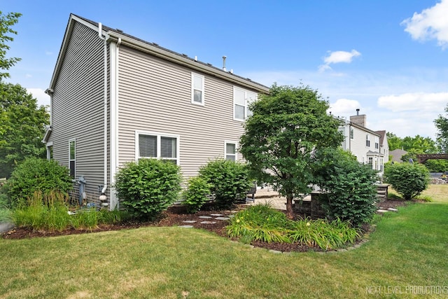 1211 Hall St, Sugar Grove, IL 60554 - view of home's exterior featuring a yard