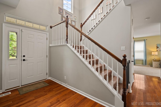 1211 Hall St, Sugar Grove, IL 60554 - entrance foyer with wood finished floors, healthy amount of natural light, and stairway