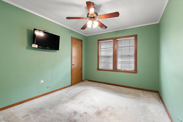3334 W 114th St, Chicago, IL 60655 - carpeted empty room with a ceiling fan and crown molding