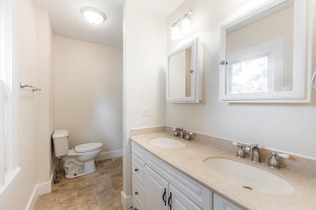 620 Elm St, Maple Park, IL 60151 - bathroom featuring double vanity and tile patterned floors