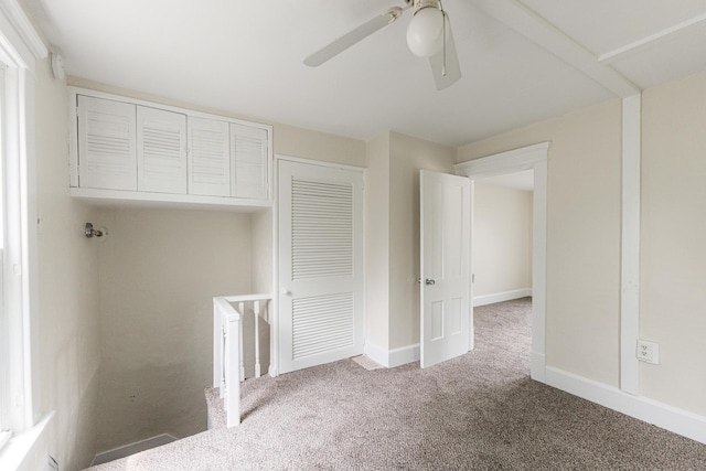 620 Elm St, Maple Park, IL 60151 - unfurnished bedroom featuring carpet, a closet, and a ceiling fan