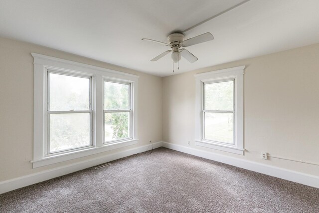 620 Elm St, Maple Park, IL 60151 - carpeted empty room with a ceiling fan and healthy amount of natural light