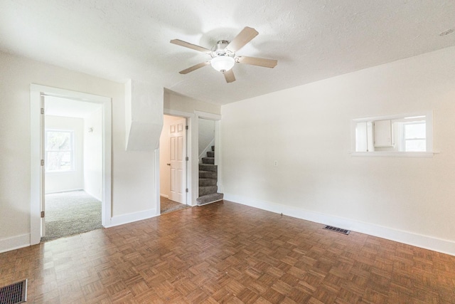 620 Elm St, Maple Park, IL 60151 - spare room with stairway and ceiling fan