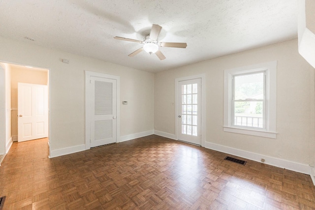 620 Elm St, Maple Park, IL 60151 - unfurnished room featuring a ceiling fan and a textured ceiling
