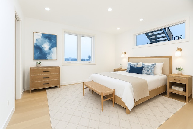 1325 N Artesian Ave Unit 2, Chicago, IL 60622 - bedroom featuring multiple windows, light wood finished floors, and recessed lighting