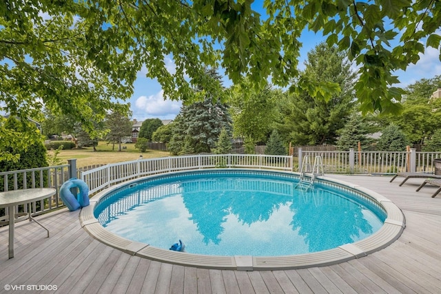 732 Green Castle Ct, West Dundee, IL 60118 - view of swimming pool featuring a wooden deck and view of scattered trees