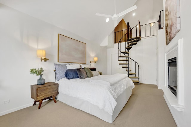 826 S Bell Ave, Chicago, IL 60612 - carpeted bedroom featuring high vaulted ceiling and a glass covered fireplace