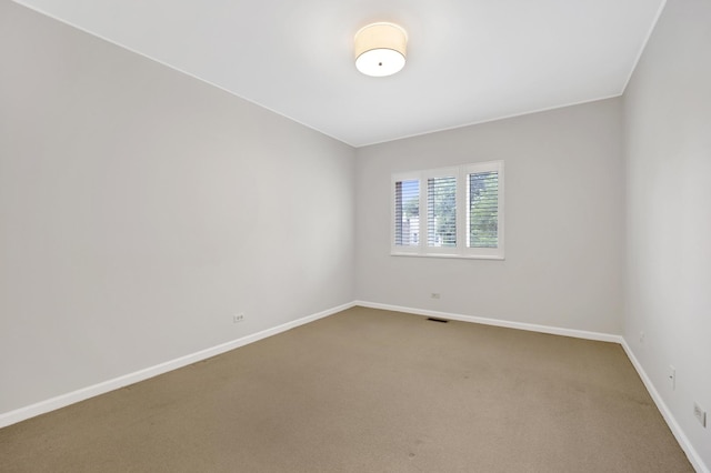 826 S Bell Ave, Chicago, IL 60612 - carpeted empty room featuring baseboards