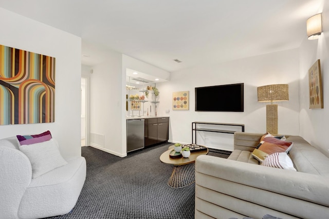826 S Bell Ave, Chicago, IL 60612 - living area with dark colored carpet and recessed lighting