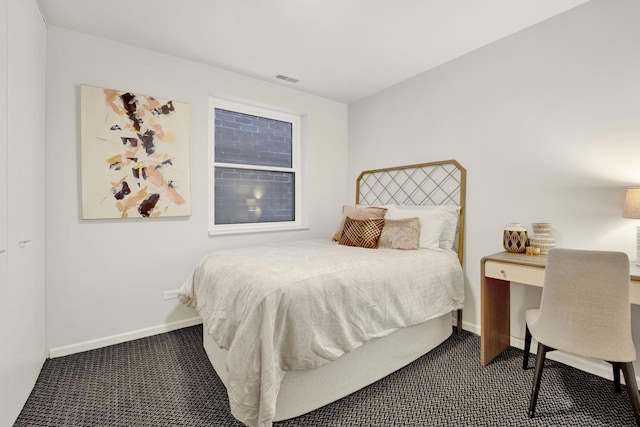 826 S Bell Ave, Chicago, IL 60612 - carpeted bedroom with baseboards and a desk