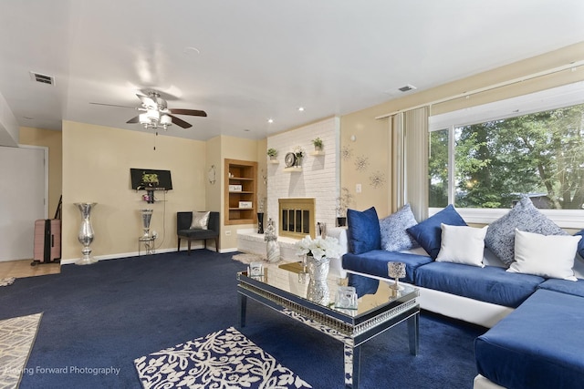 109 Walnut St, Park Forest, IL 60466 - living room with a ceiling fan, carpet, and a brick fireplace